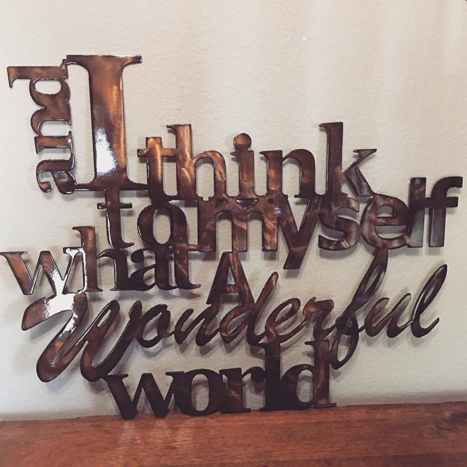 louis Armstrong. and i think to myself what a wonderful world. metal home decor sign